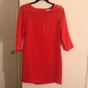 Red sleeved dress with gold button detail